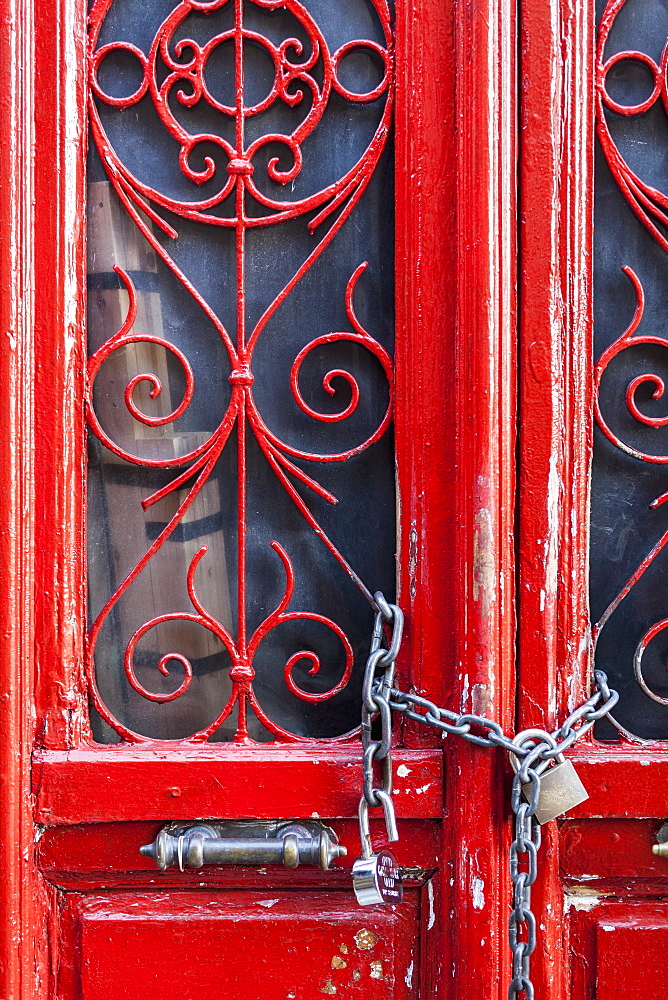 Red Door With Decorative Windows Chained Shut With A Padlock, Athens, Greeec