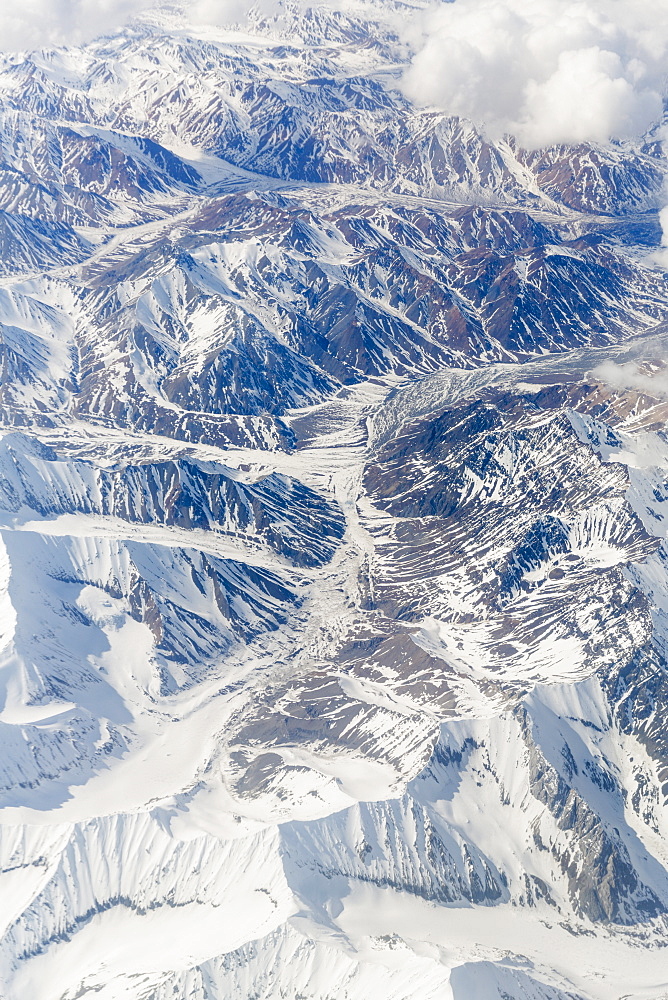 Aerial View Of A River Valley Surrounded By Snow Capped Mountains, Alaska Range, Interior Alaska, USA, Winter