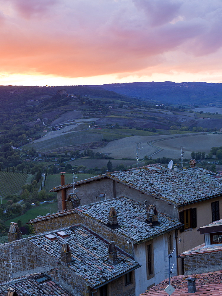 Sunset Over Farmland With Houses In The Foreground, Orvieto, Umbria, Italy