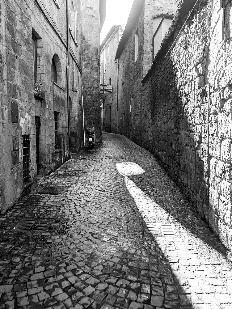 Narrow Cobblestone Alley Between Buildings, Orvieto, Umbria, Italy