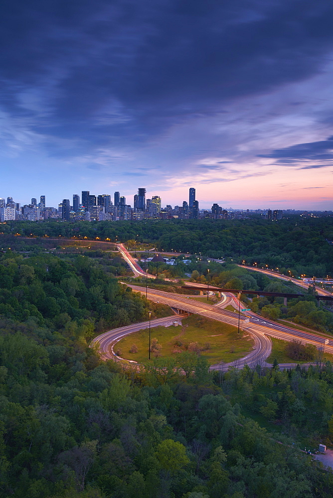 Sunset Looking South Over The Don Valley, Bloor On-Ramp, Toronto Skyline And Don Valley Parkway, Toronto, Ontario, Canada