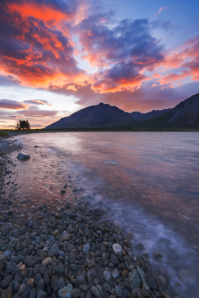 Colors Of Sunset Fill The Sky Over Upper Twin Lake In Lake Clark National Park & Preserve, Alaska.