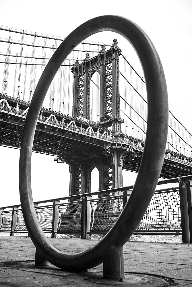 Manhattan Bridge Viewed Through A Circular Structure On The Promenade, New York City, New York, United States Of America