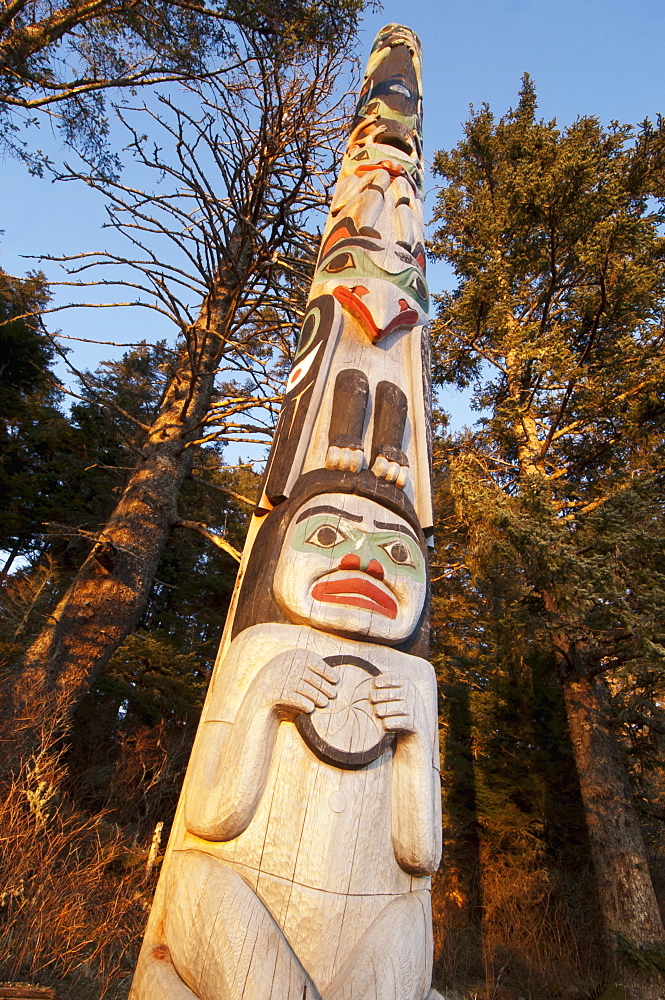 A Totem Dedicated To Japanese Photographer Michio Hoshino Catches Evening Light In The Winter At The Halibut Cove Recreation Area, Sitka, Alaska, United States Of America