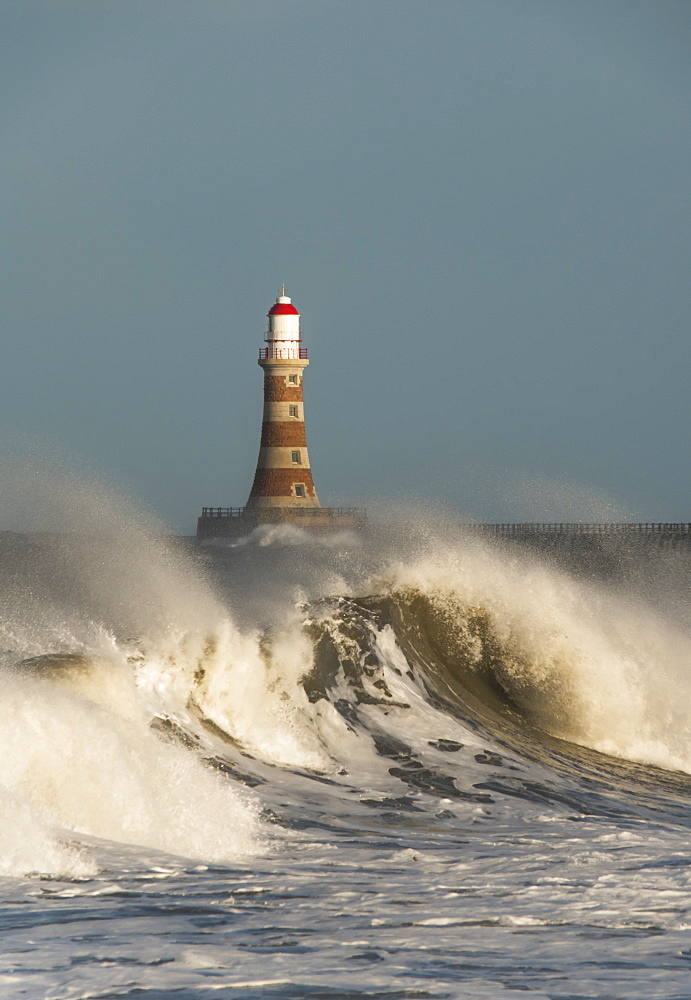 Waves Breaking And Roker Pier Lighthouse, Sunderland, Tyne And Wear, England