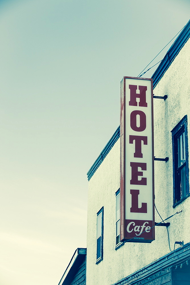 Hotel Sign On The Side Of A Building Against A Blue Sky, Saskatchewan, Canada