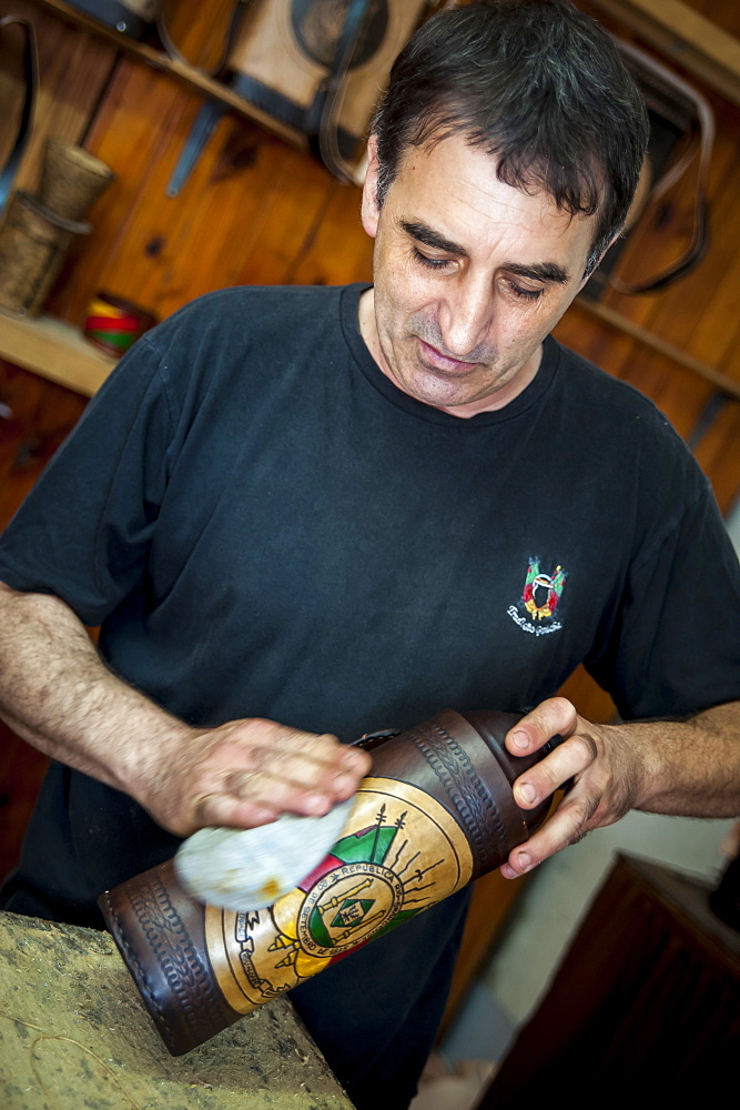 A Man Polishing A Handmade Craft, Pelotas, Rio Grande Do Sul, Brazil