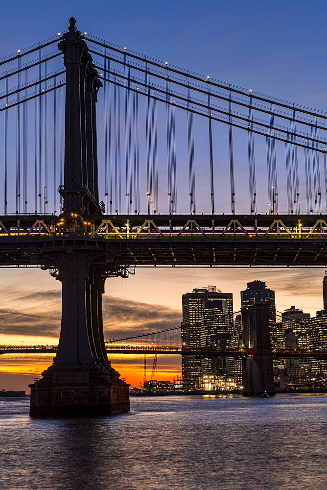 Sunset Behind Manhattan And Brooklyn Bridges, New York City, New York, United States Of America