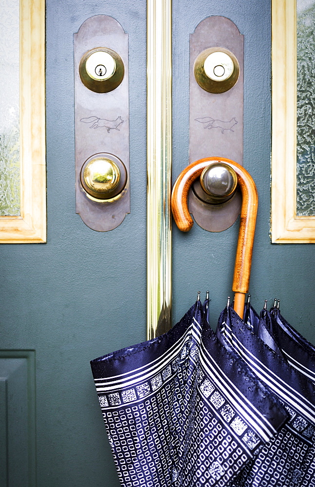 Umbrella Hanging From A Door Handle, Surrey, British Columbia, Canada