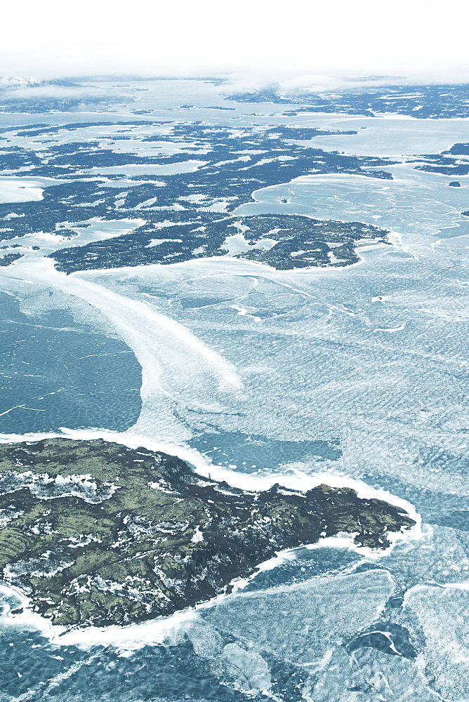 Aerial View Of The Frozen Water And Landscape In Winter, Alaska, United States Of America