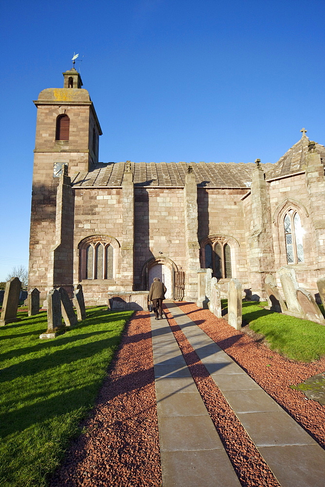 Northumberland, England; A Church And Cemetery