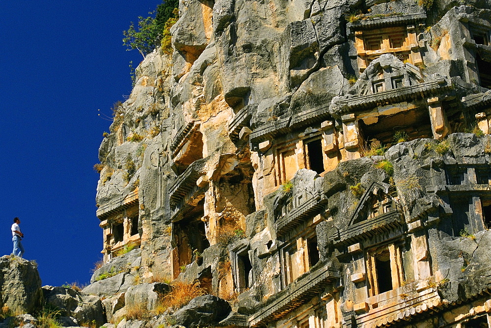 Low angle view of caves on rocks, Lycian Rock Tomb, Myra, Turkey