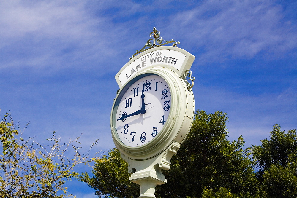 Low angle view of a clock in a city, Lake Worth, Florida, USA