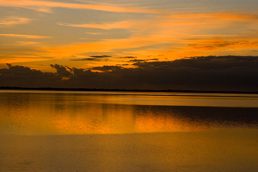 Reflection of clouds in water, St. Augustine Beach, Florida, USA