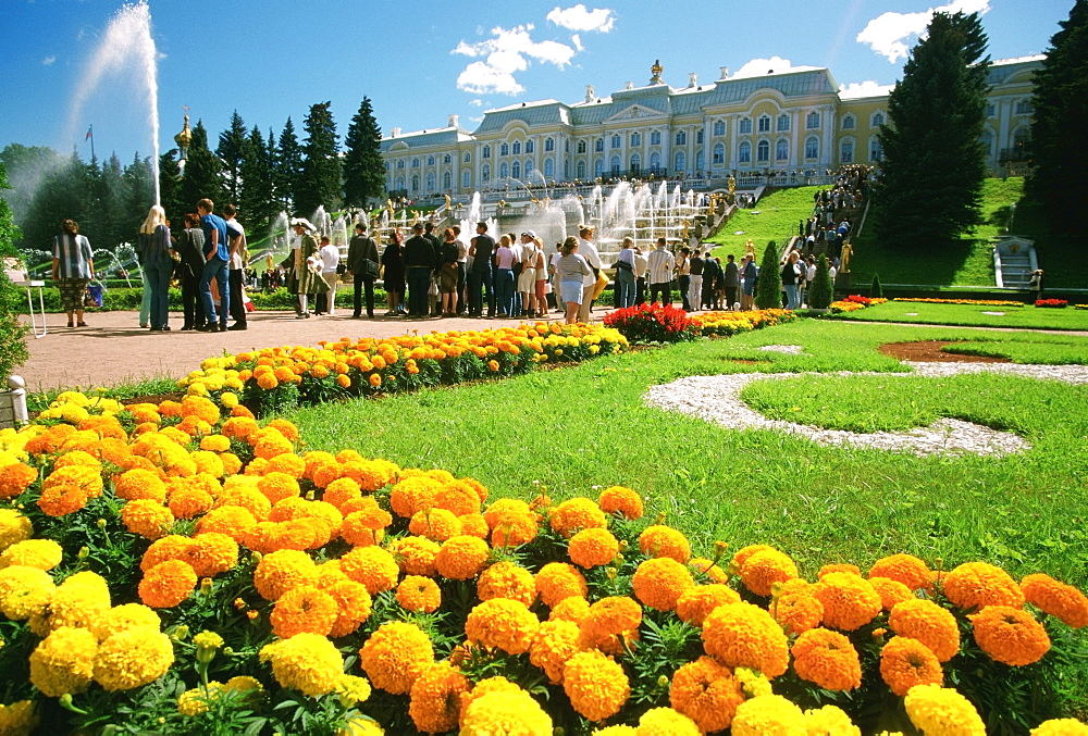 Tourists in the garden of a palace, Peterhof Grand Palace, St. Petersburg, Russia