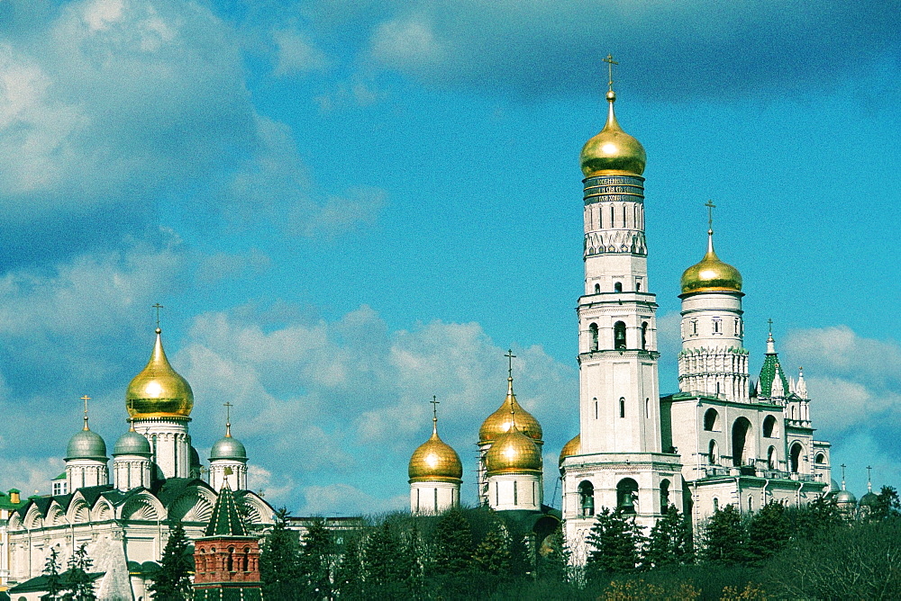 Low angle view of golden cupolas, Bell Tower of Ivan The Great, Moscow, Russia