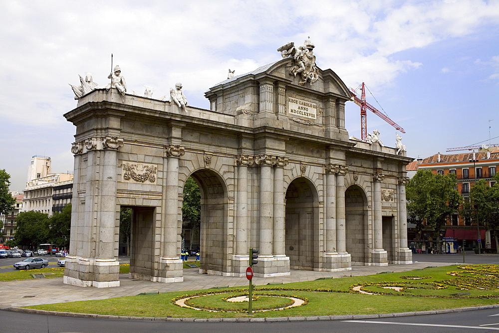 Memorial gate at the roadside, Alcala Gate, Madrid, Spain