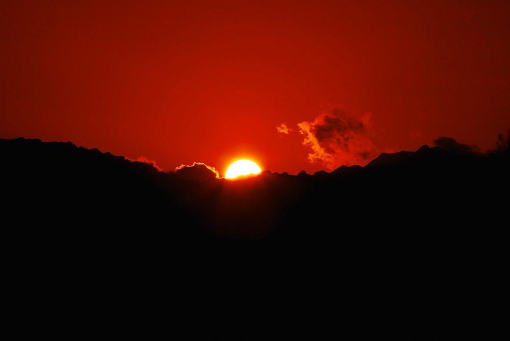 Sunset over a mountain, Nawiliwili Beach Park, Kauai, Hawaii Islands, USA