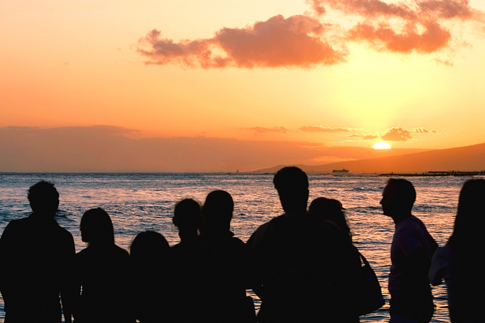 Group of people looking at a view on the beach, Waikiki Beach, Honolulu, Oahu, Hawaii Islands, USA