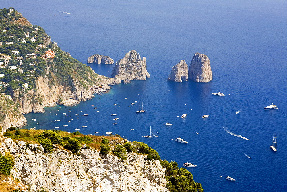 High angle view of boats in the sea, Faraglioni Rocks, Capri, Campania, Italy