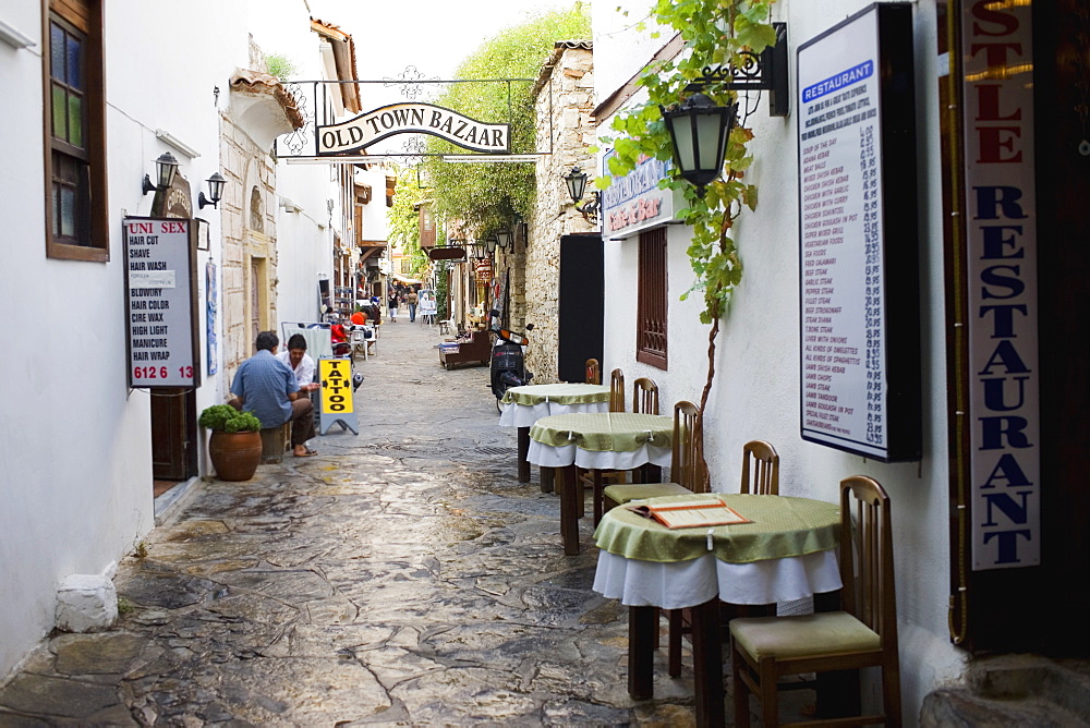 Empty chairs and tables in front of a restaurant in a street, Ephesus, Turkey