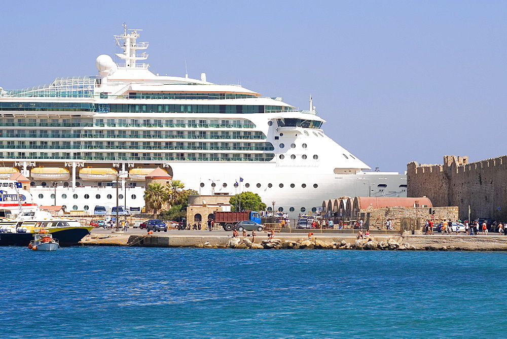 Cruise ship at a harbor, Mandraki Harbor, Rhodes, Dodecanese Islands, Greece