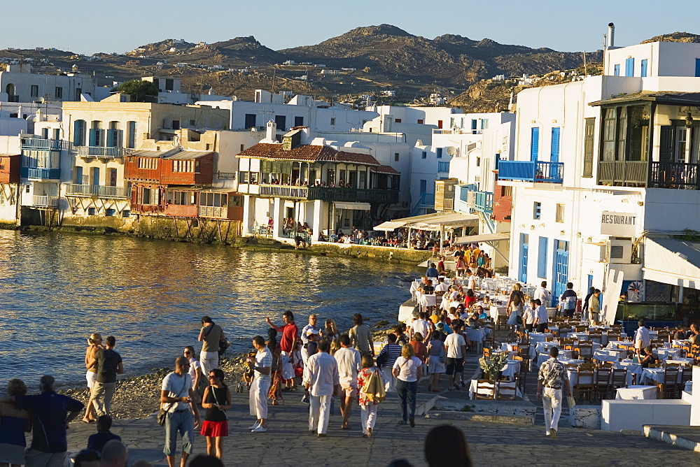 Large group of people standing at the coast, Mykonos, Cyclades Islands, Greece