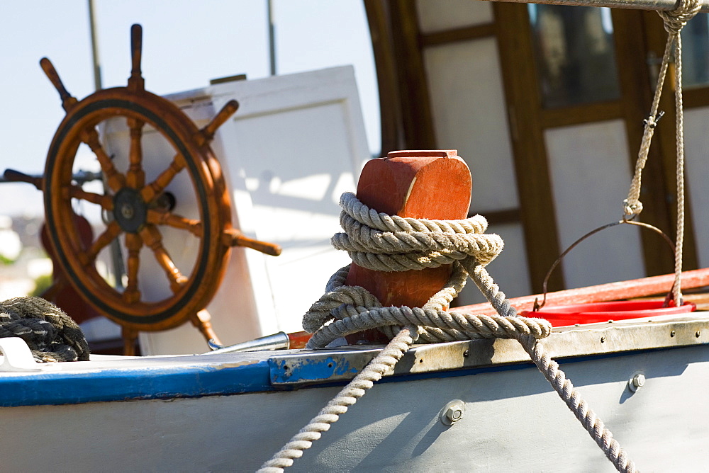 Boat tied up with a rope, Patmos, Dodecanese Islands, Greece