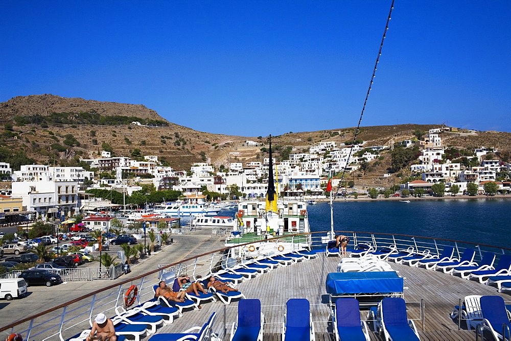 High angle view of lounge chairs on the deck of a ship, Skala, Patmos, Dodecanese Islands, Greece