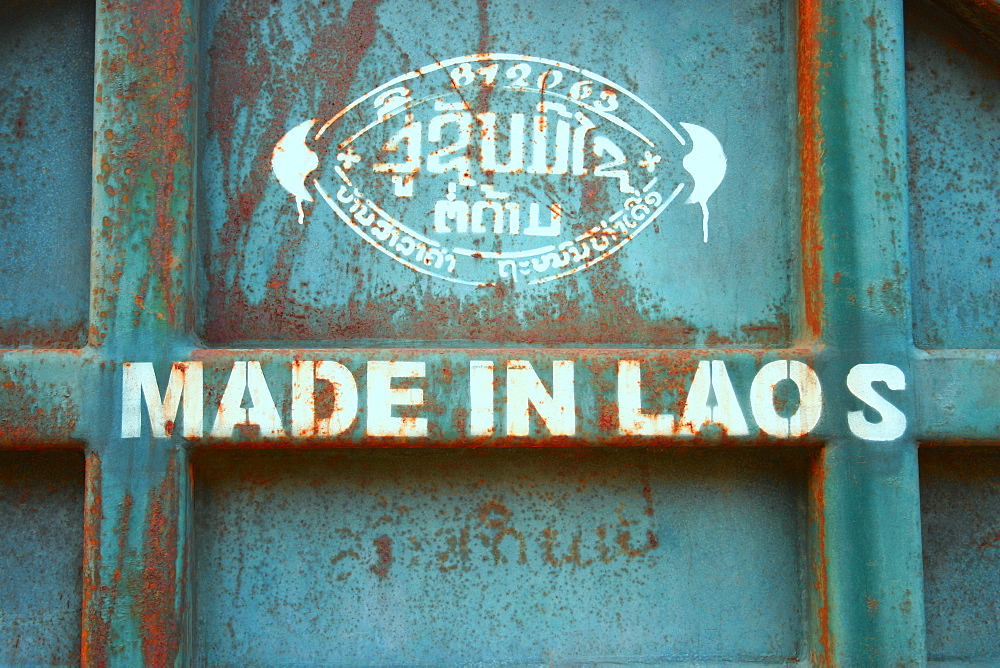 Close-up of a text on a metal surface, Vientiane, Laos