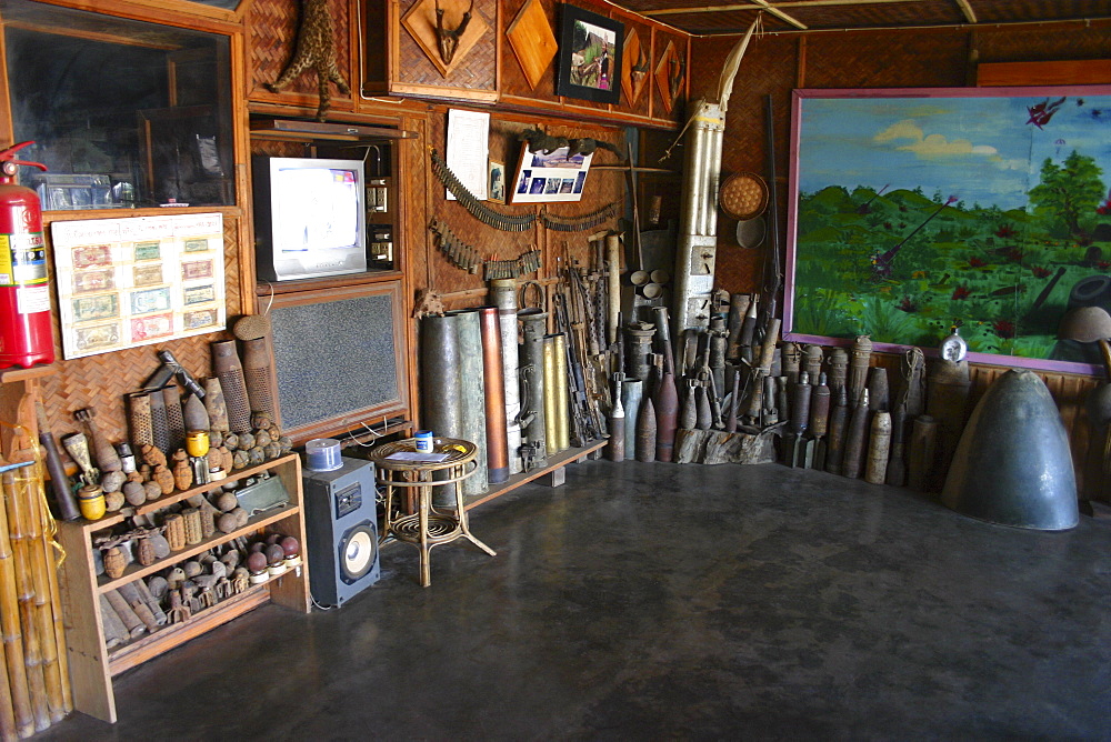 Antique objects displayed in a room, Phonsavan, Laos