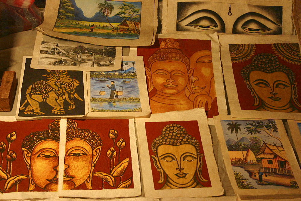 Close-up of posters and paintings, Night Market, Luang Prabang, Laos