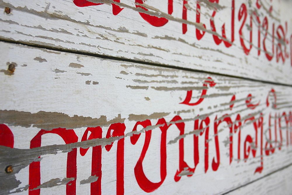 Close-up of a non-western script on a wood, Luang Prabang, Laos