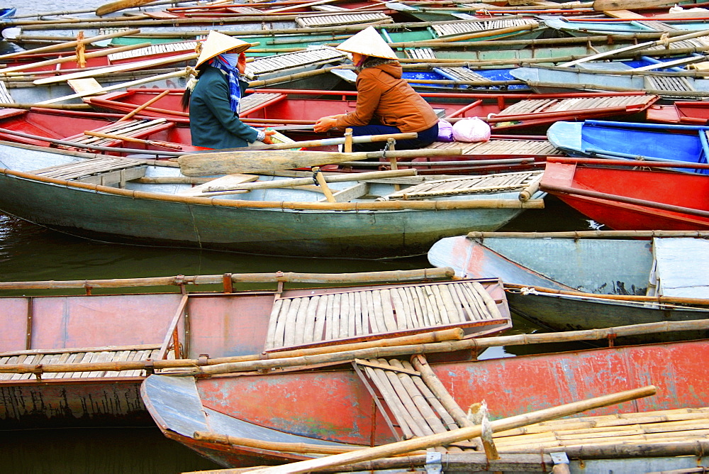 Two women sitting in the boat, Dong Hoi, Vietnam