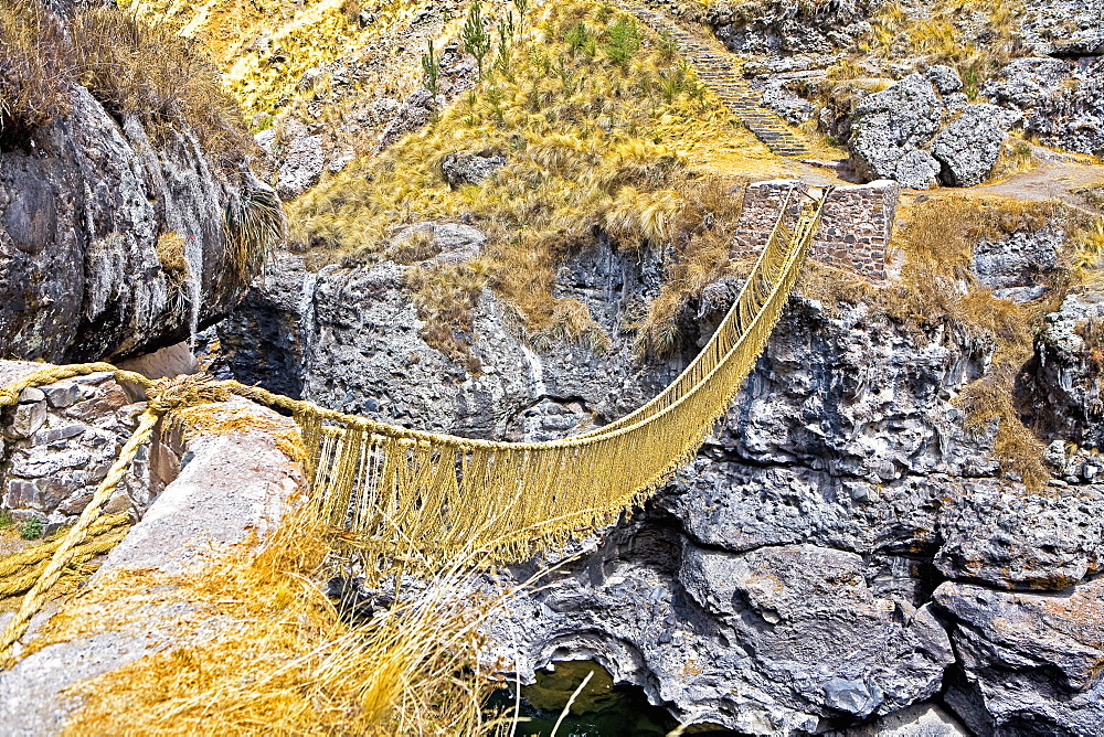 High angle view of a rope bridge across a mountain, Queswachaca, Peru