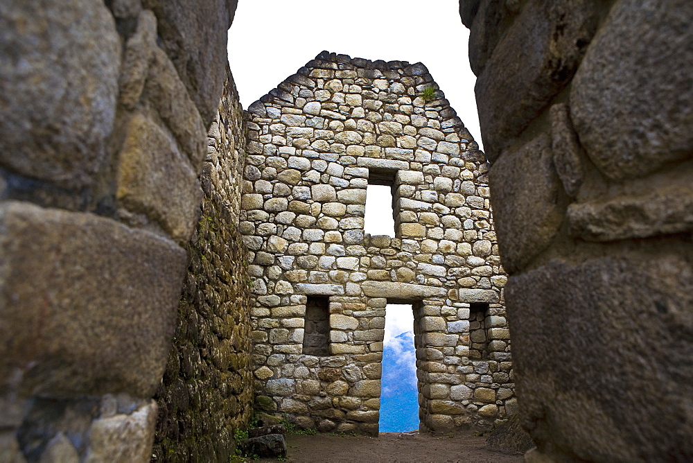 Low angle view of the old ruins, Aguas Calientes, Mt Huayna Picchu, Machu Picchu, Cusco Region, Peru