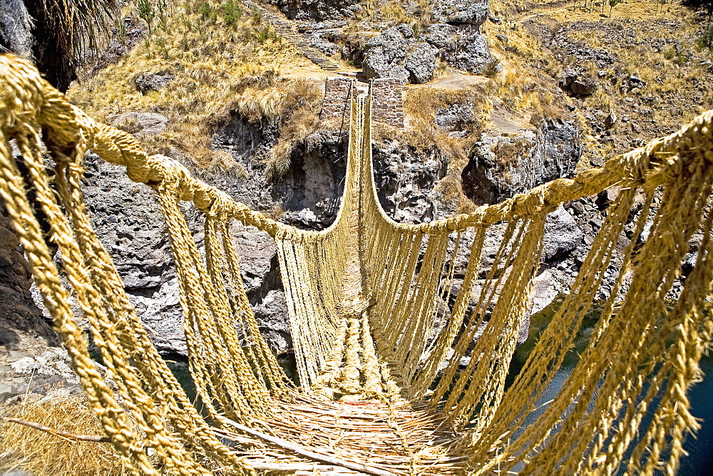 Rope bridge across a mountain, Queswachaca, Peru