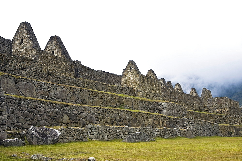 Low angle view of ruins on mountains, Machu Picchu, Cusco Region, Peru