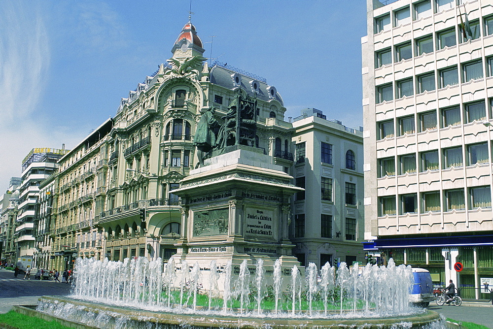 Statue and a fountain in front of buildings, Granada, Andalusia, Spain