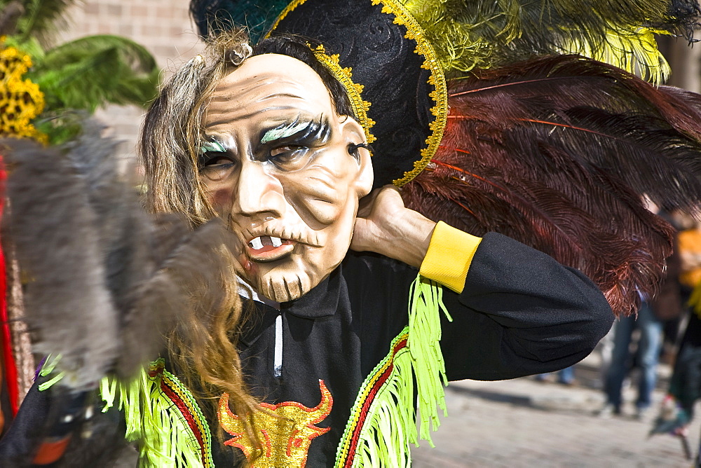 Close-up of a person wearing a traditional costume on a festival, Peru