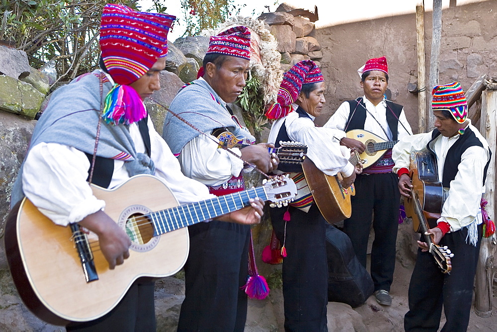 Five guitarists performing, Lake Titicaca, Taquile Island, Puno, Peru