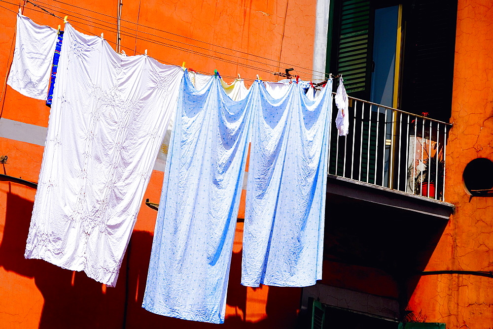 Low angle view of clothes hanging on a clothesline, Naples, Naples Province, Campania, Italy