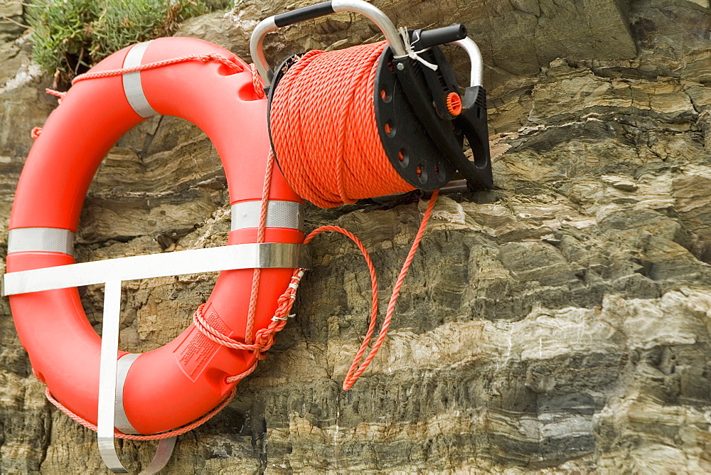 Life belt hanging on cliff, Cinque Terre National Park, RioMaggiore, Cinque Terre, La Spezia, Liguria, Italy