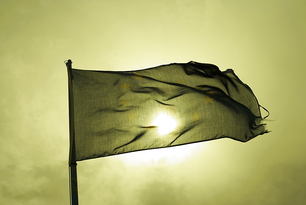 Low angle view of a flag fluttering, Italian Riviera, Cinque Terre National Park, Mar Ligure, Cinque Terre, La Spezia, Liguria, Italy