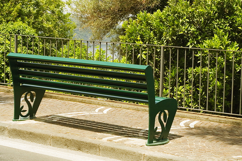 Bench on the sidewalk, Via Padre Reginaldo Giuliani, Sorrento, Sorrentine Peninsula, Naples Province, Campania, Italy