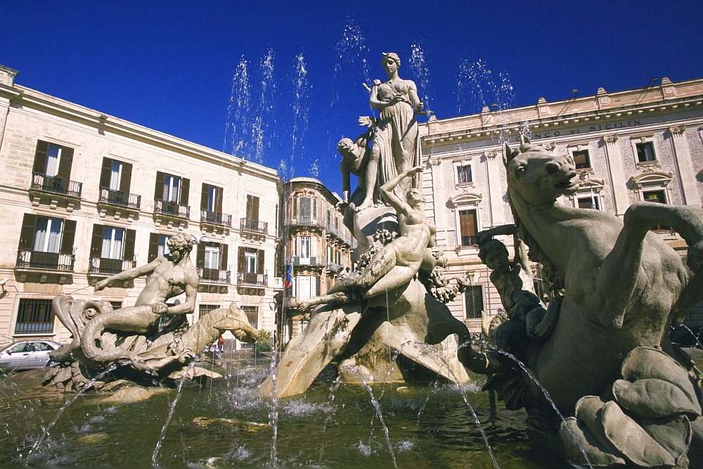 Statues in front of a building, Siracusa, Sicily, Italy