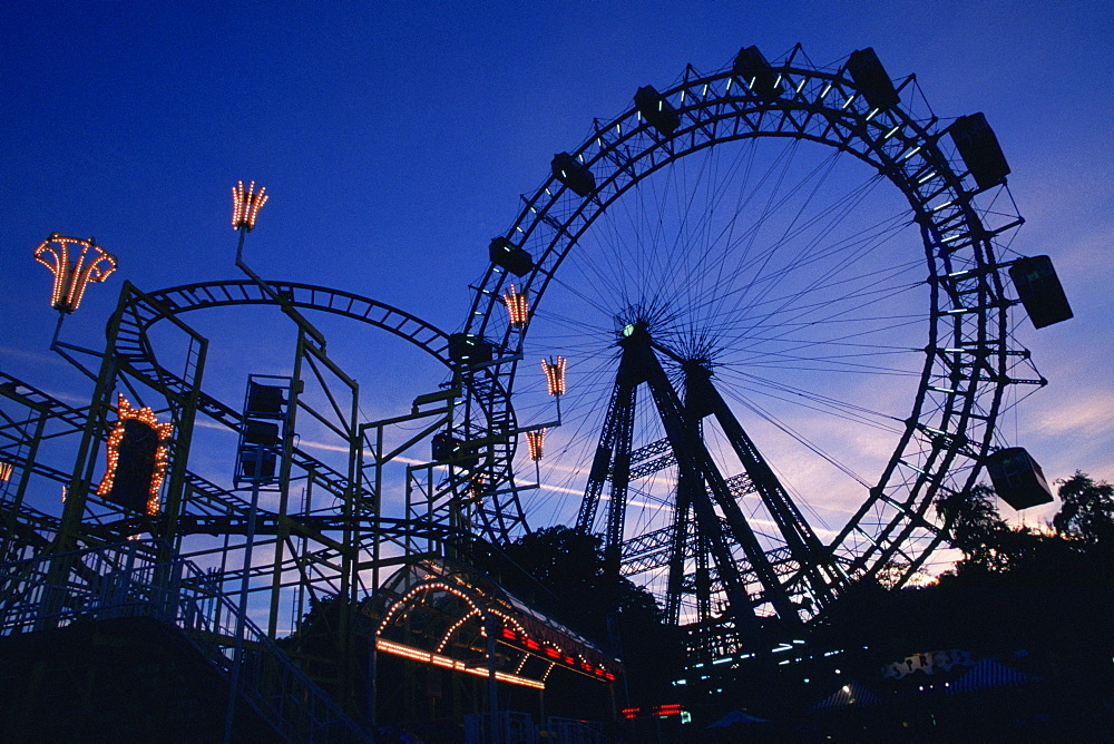 Silhouette of amusement park rides, Prater Park, Vienna, Austria