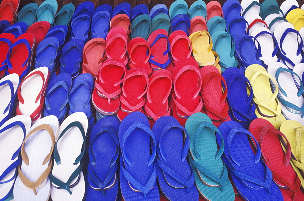 Close-up of flip-flops in a store