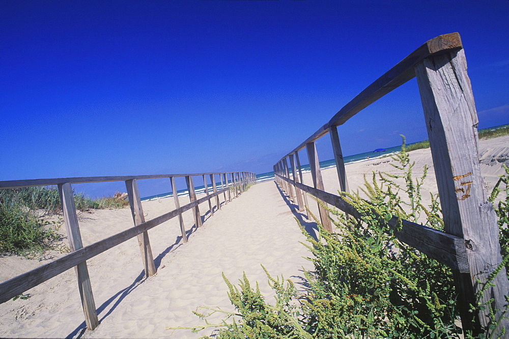 Wooden fence on the beach, Texas, USA