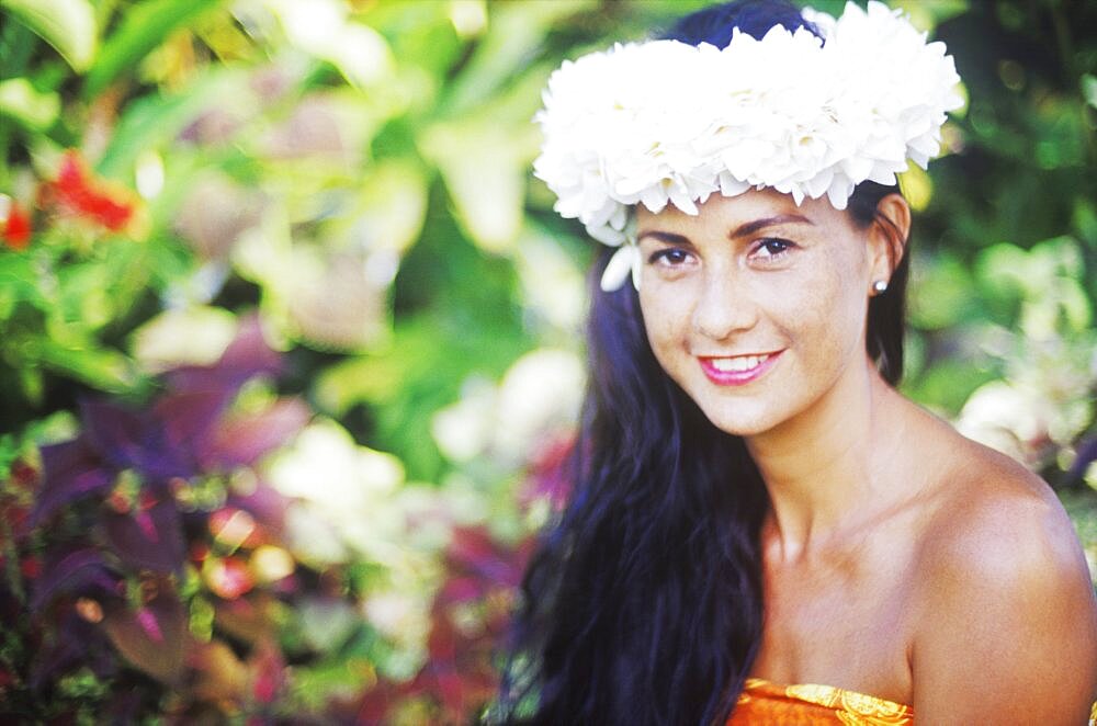 Portrait of a young woman smiling, Hawaii, USA